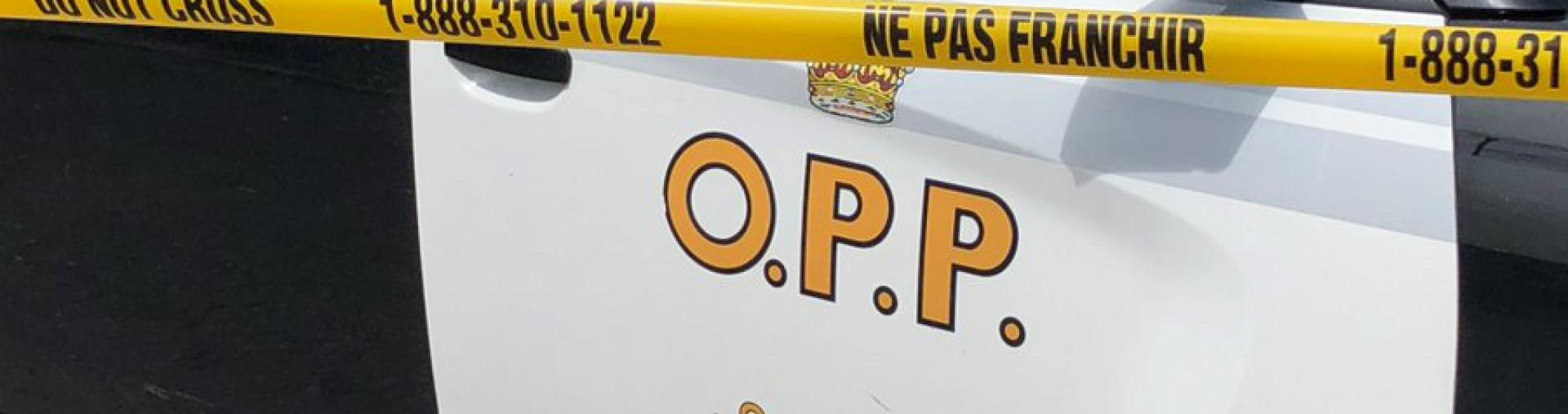 OPP cruiser and police tape