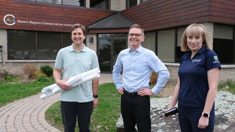 Staff of the RRCA stand in front of their office.