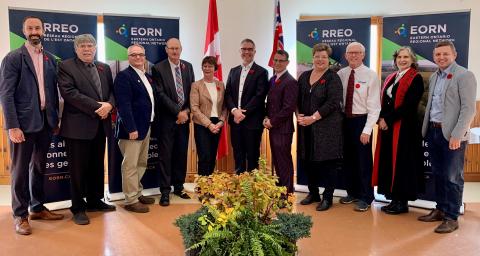 Officials celebrate EORN's latest announcement.