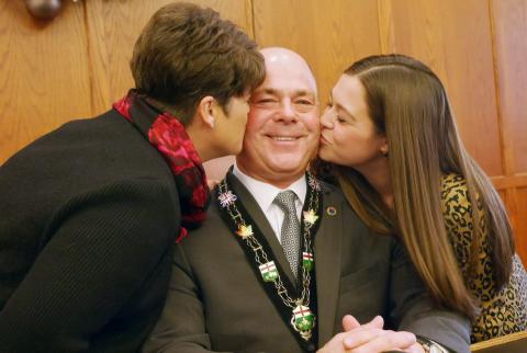 Warden Tony Fraser and his wife Amy and daughter Emma.