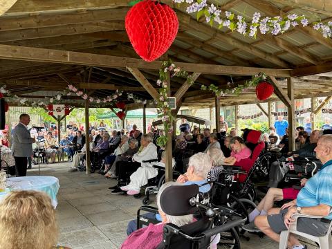 On July 12, the sun smiled down on Dundas Manor as residents, families, staff, and community members came together to celebrate 45 years of caring. The afternoon included a Manor Market of wonderful auction items, a quilt raffle – and, of course, strawberries, ice cream, and birthday cake.