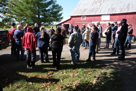 Participants from the 2019 Agri-Action Tour learn about agricultural stewardship practices at a farm in North Glengarry. 