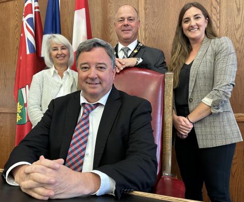 Warden-elect Jamie MacDonald, seated, is flanked by SDG Counties CAO Maureen Adams, Warden Tony Fraser and Director of Corporate Services/Clerk Kimberly Casselman.