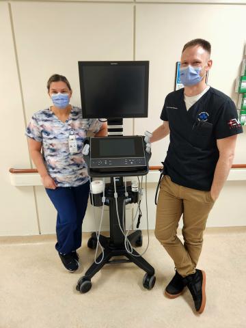 Registered Practical Nurse Sheri Desjardins and Dr. Adam Jones-Delcorde with the new ultrasound machine.
