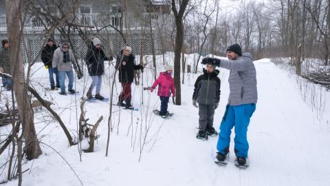 Visitors head out on a guided snowshoe adventure during last year's World Wetlands Day event at Cooper Marsh Conservation Area.