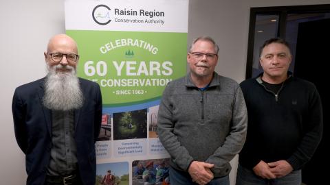 General manager Richard Pilon, standing with newly elected Board Chair, Bryan McGillis, and Vice-Chair, Jacques Massie.