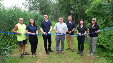 Reopening all trails at Cooper Marsh Conservation Area. From left: Pete Sabourin, RRCA Field Operations Team Lead, Lisa Van De Ligt, RRCA Communications and Stewardship Team Lead, Michael Lazaris, Constituency Assistant for MPP Nolan Quinn, Jacques Massie, RRCA Vice-Chair, Brendan Jacobs, RRCA Stewardship Specialist, Marie-Paule Godin, DUC Manager of Provincial Operations for Ontario, and Meredith Meeker, DUC Conservation Programs Specialist. 