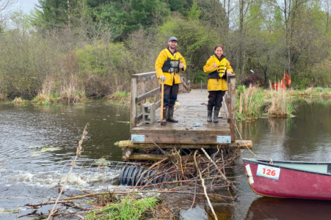 RRCA summer staff install flow regulation device at RRCA Conservation Area.